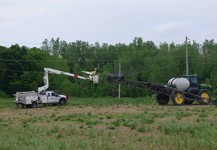 Sprayer gets caught in power lines